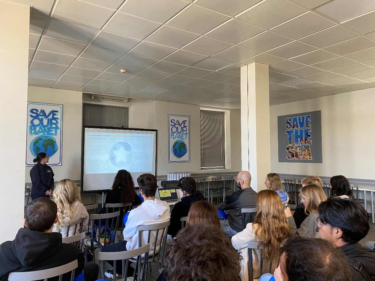 A group of people in a room AI-generated content may be incorrect.